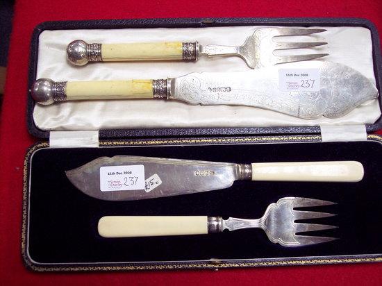 Appraisal: Additional LotTwo pairs of fish servers with bone handles in