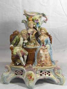 Appraisal: A porcelain group of three figures playing chess probably late