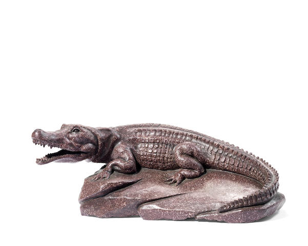 Appraisal: An Italian th century red porphyry crocodile on an integral