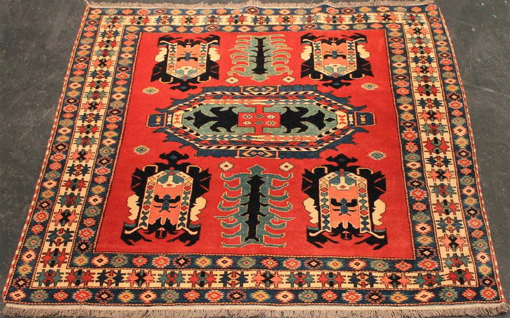 Appraisal: KAZAK CENTRAL ASIA RUG on a bold red field with