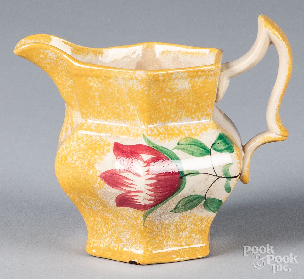 Appraisal: Yellow spatter creamer Yellow spatter creamer with tulip h Competitive