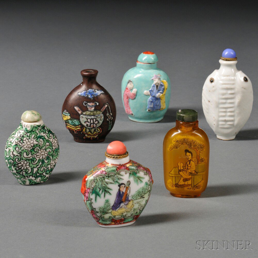 Appraisal: Six Snuff Bottles China an ovoid white porcelain with blue