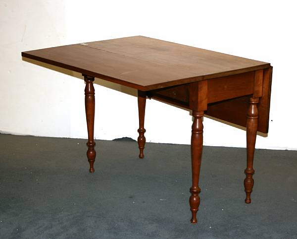 Appraisal: A Federal cherry drop leaf table early th century height