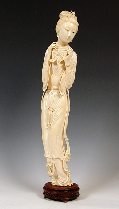 Appraisal: VERY LARGE CHINESE CARVED IVORY FIGURE OF A MAIDEN Beautifully