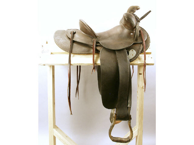 Appraisal: Early wide-fork Western saddle by Hamley Company untooled unmarked overall