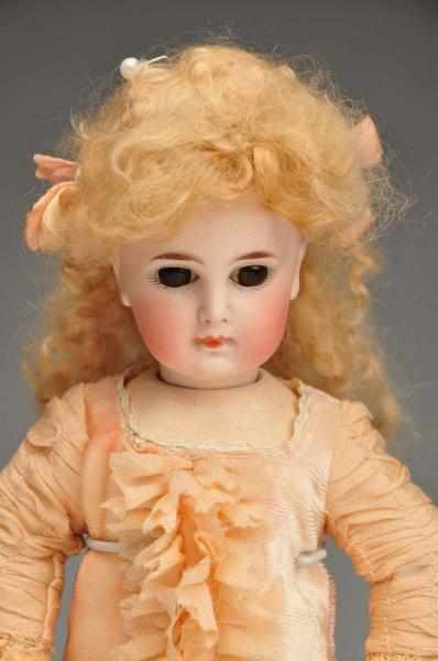 Appraisal: Early German Bisque Child Doll Description Bisque socket head in