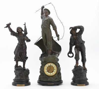 Appraisal: A Three Piece Cod Fishing Clock Garniture Set Cast spelter