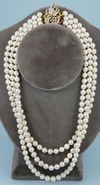 Appraisal: Ladies triple strand pearl necklace with k white yellow gold