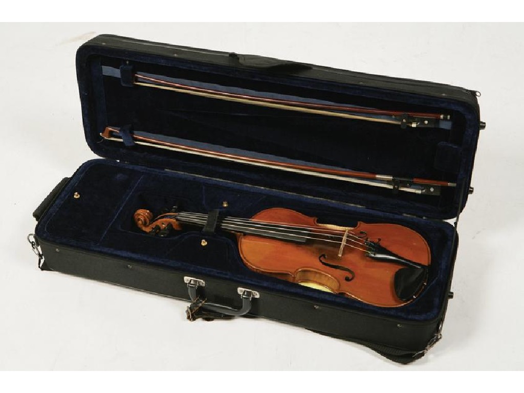 Appraisal: A VIOLIN bearing a paper label Manufactured in Dresden imitation