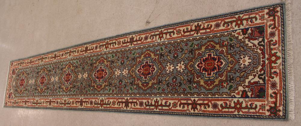 Appraisal: HAND KNOTTED ORIENTAL RUNNER Indo-Persian Serab design on light blue