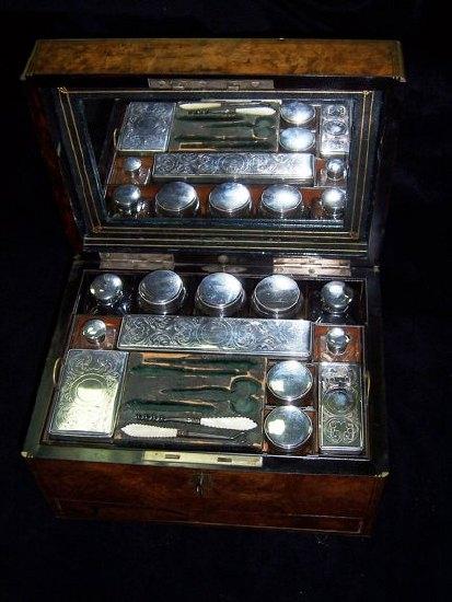 Appraisal: A Victorian dressing case with hinged lid lift out tray