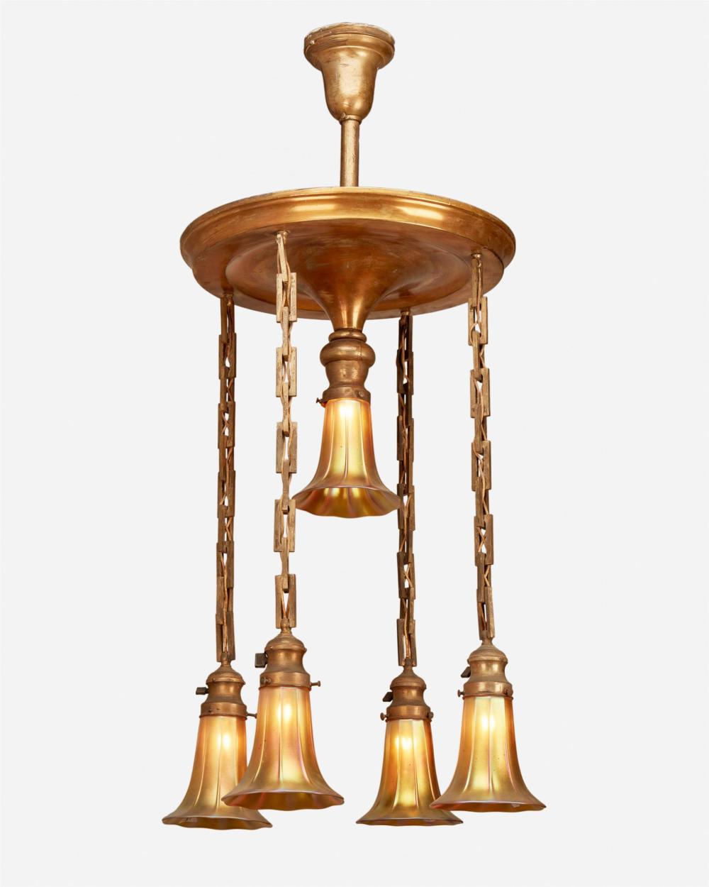 Appraisal: A gilt-metal chandelier with Steuben Aurene glass shades Second-quarter th