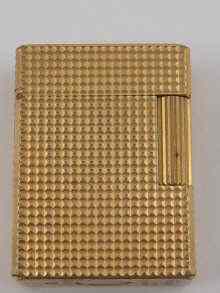 Appraisal: A gold plated Dupont de Paris cigarette lighter