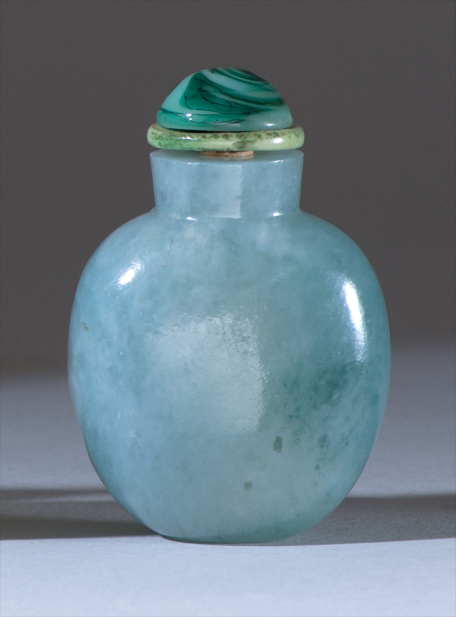 Appraisal: GREEN JADE SNUFF BOTTLE Late th CenturyIn ovoid form Height