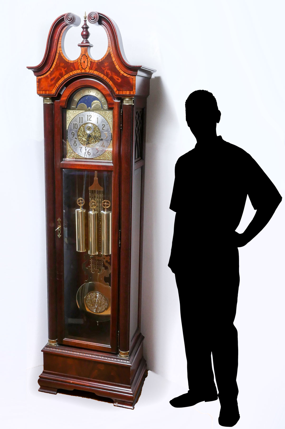 Appraisal: HOWARD MILLER GRANDFATHER CLOCK Surmounted by a broken scrolling pediment