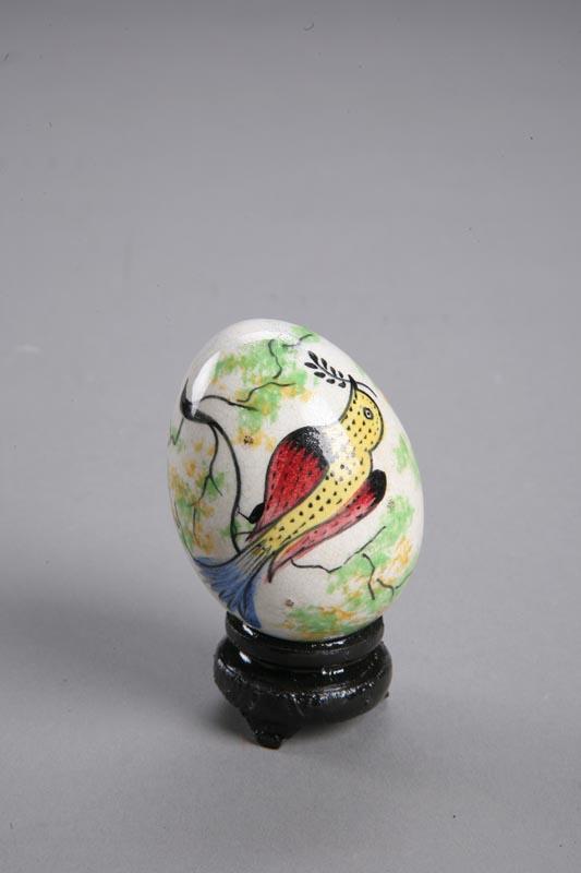 Appraisal: RAINBOW SPATTERWARE EGG English st half- th century Rare yellow