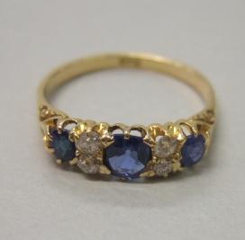 Appraisal: A gold sapphire and diamond set ring mounted with three