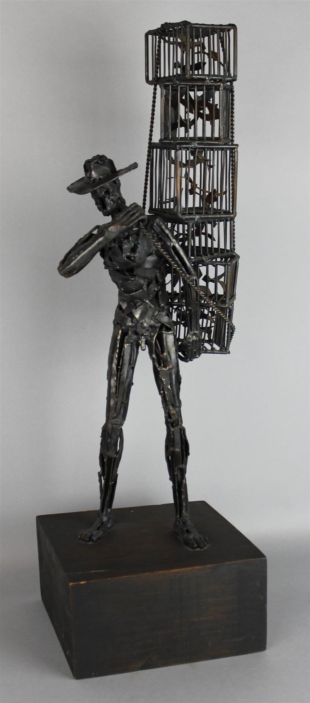 Appraisal: AFTER ROBERT EDWARD KUHN MAN WITH BIRDCAGES Patinated metal in