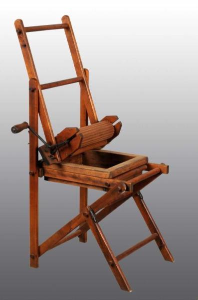 Appraisal: Wooden Upright Wringer Machine Description Circa Made of oak Condition