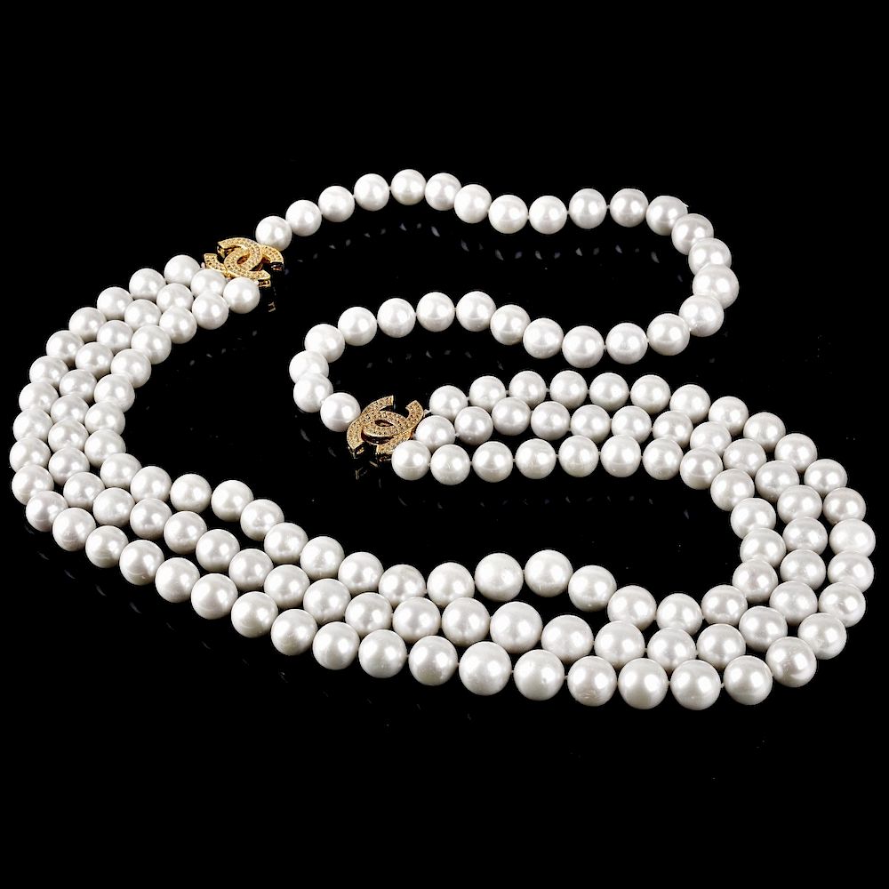 Appraisal: Chanel Pearl Necklace Chanel Three Strand White Pearl Necklace with