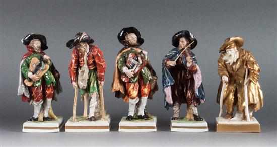 Appraisal: Five Capodimonte porcelain figures th century three destitute musicians lame