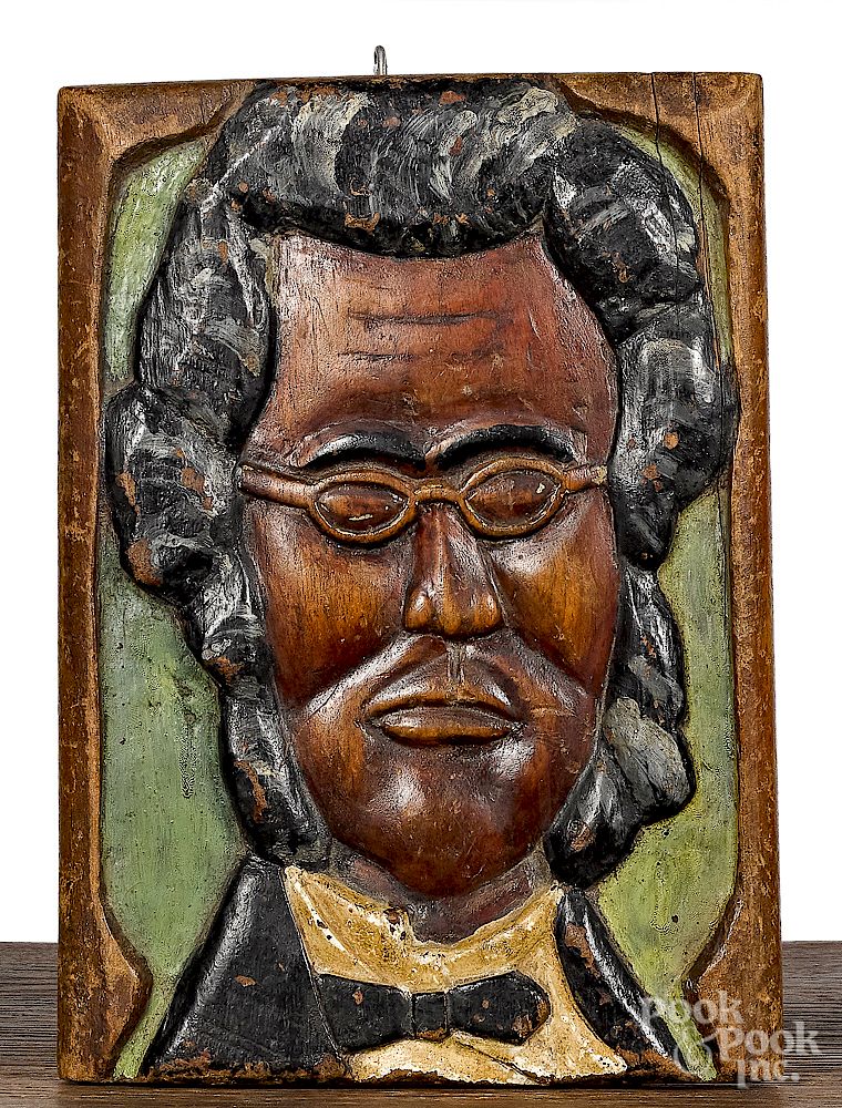 Appraisal: Carved and painted plaque Exclusive on Bidsquare Carved and painted