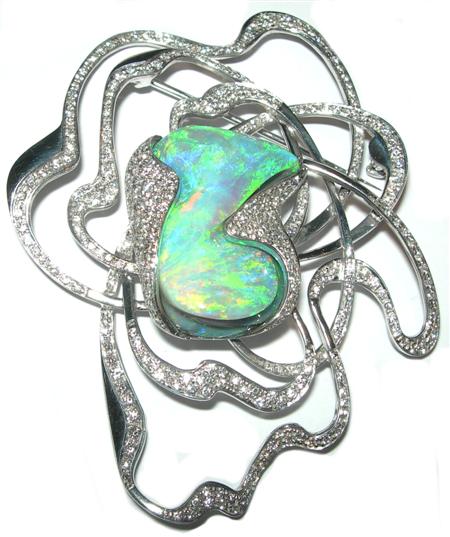 Appraisal: A stunning contemporary opal and diamond set brooch the central