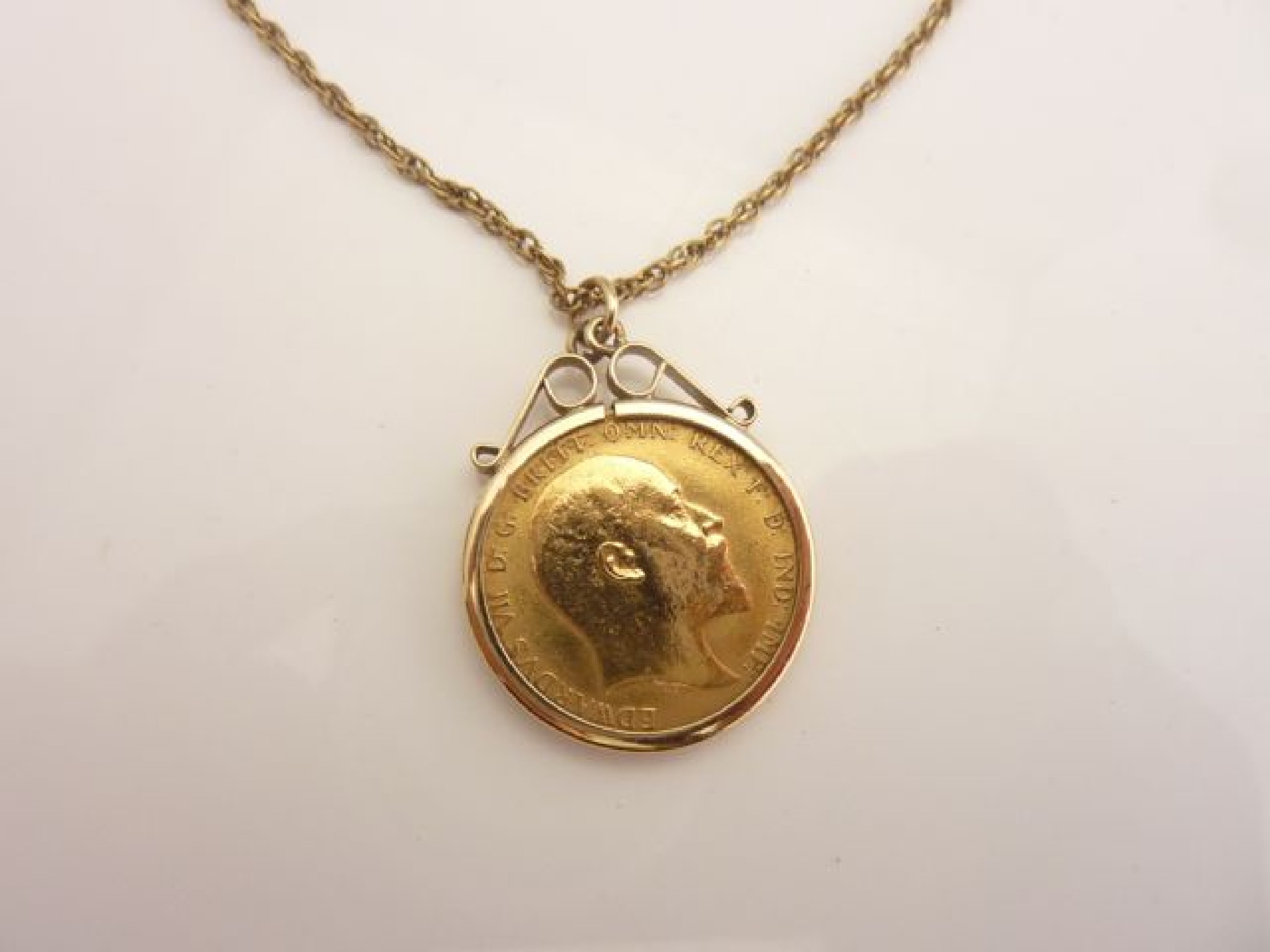 Appraisal: A sovereign coin pendant mounted in a ct gold frame