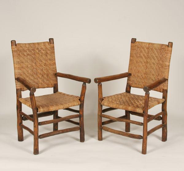 Appraisal: Pair hickory arm chairs with woven seat and back H