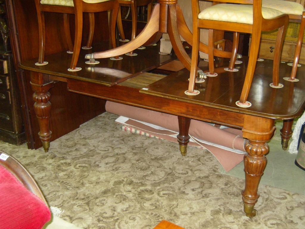 Appraisal: A substantial William IV early Victorian extending mahogany dining table