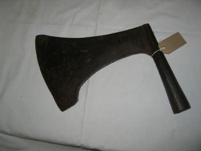 Appraisal: AN IRON AXE HEAD with blade and socket inscribed DELETT