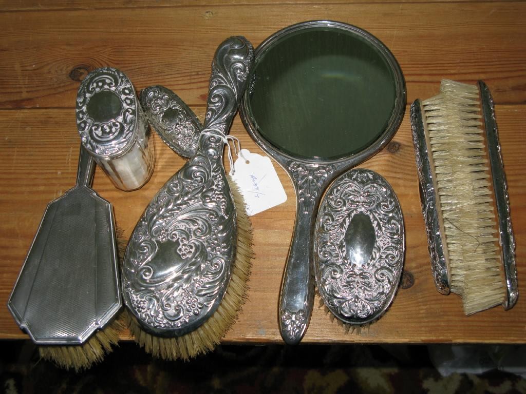 Appraisal: Silver dressing table accessories to include two hairbrushes two clothes