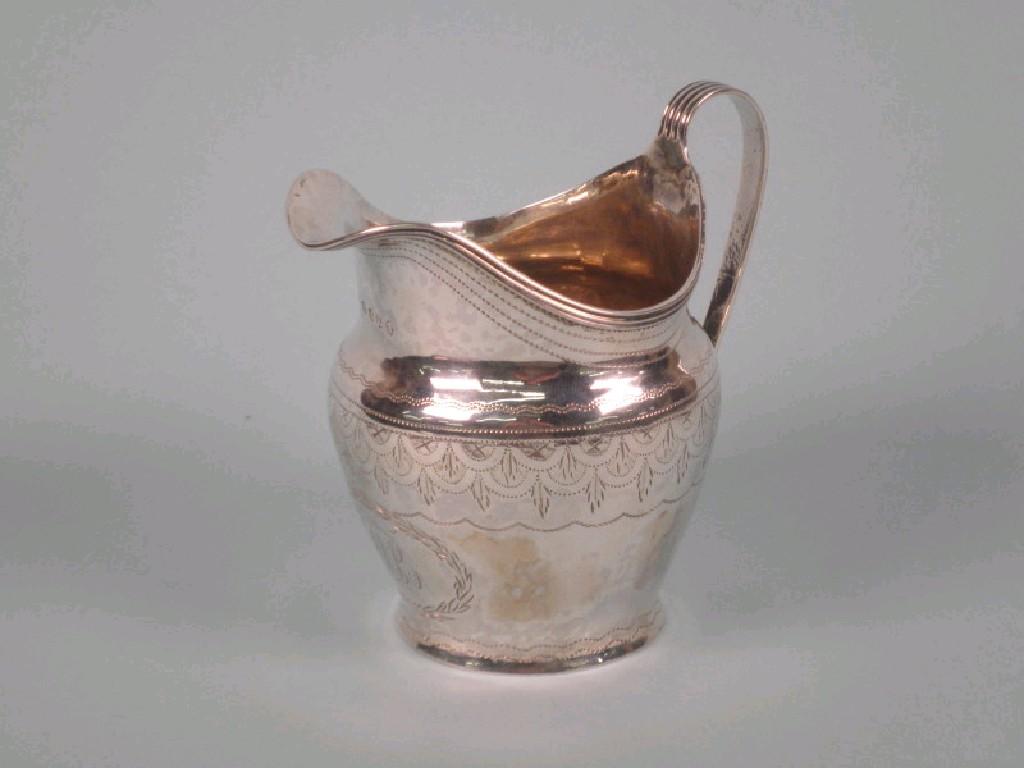 Appraisal: A George III silver helmet shaped cream jug with bright