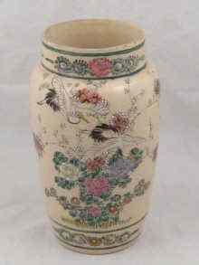 Appraisal: A ceramic vase the cream glazed body overlain with oriental