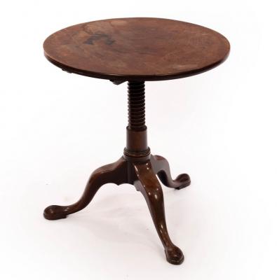 Appraisal: An early th Century mahogany circular table on a bobbin