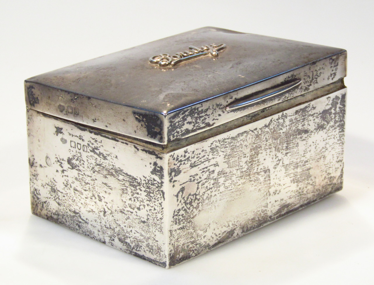 Appraisal: An Edwardian silver bridge box of plain rectangular outline the