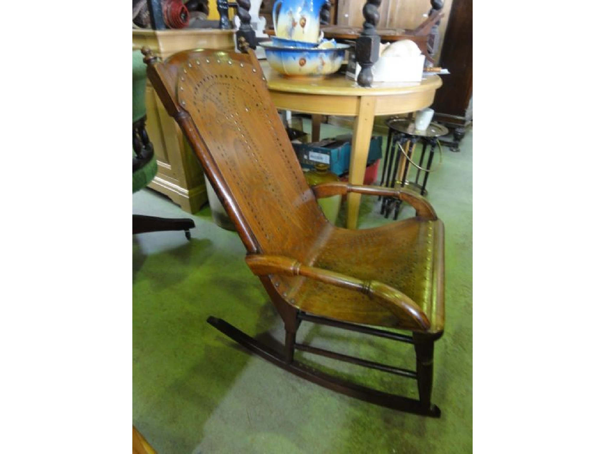 Appraisal: A late Victorian mahogany framed rocking chair with pierced plywood