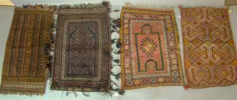 Appraisal: FOUR SMALL RUGS INCLUDING THREE SADDLE BAGS brown and orange