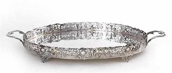 Appraisal: Continental silver footed tray first half th century ornate figural