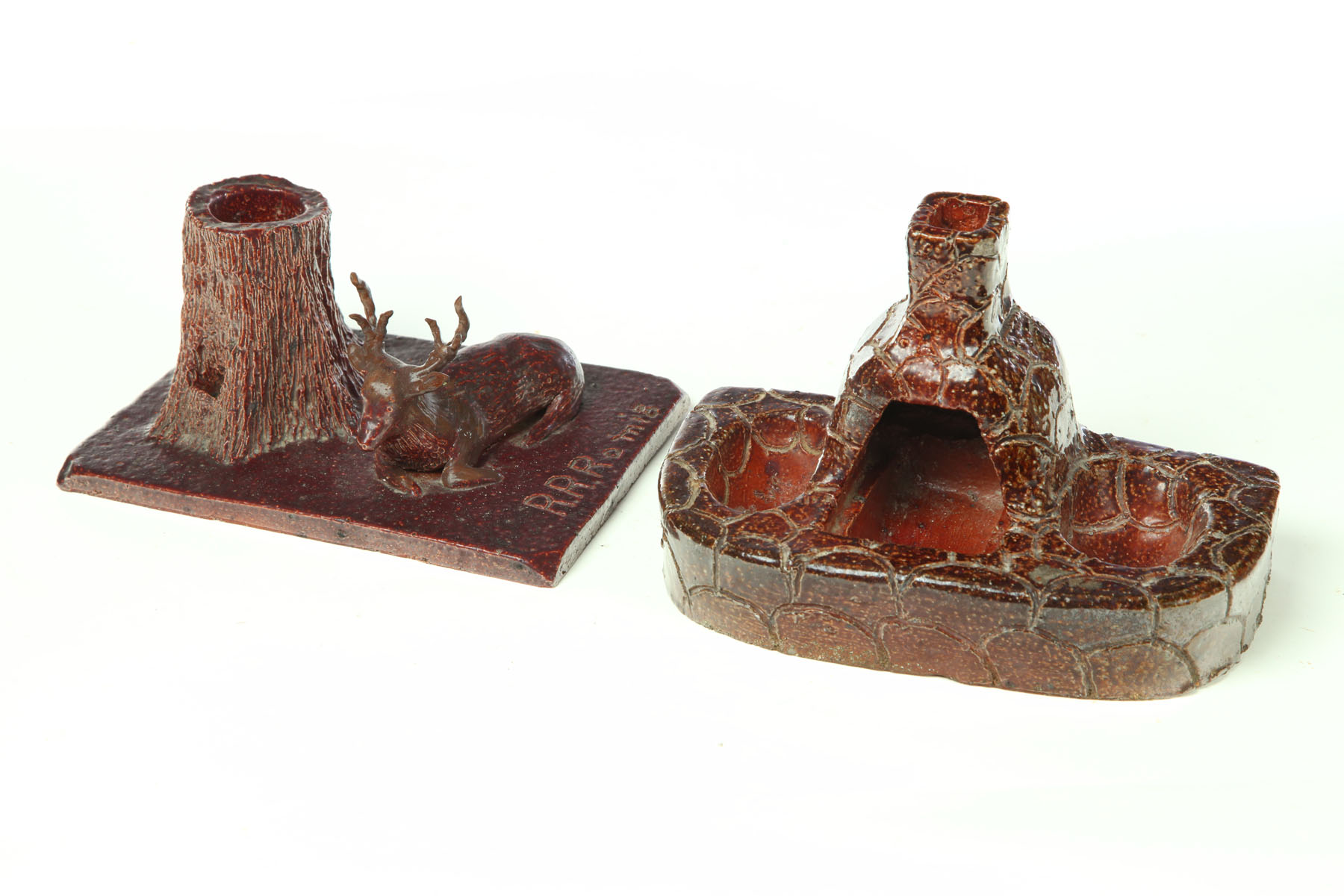 Appraisal: TWO PIECES OF SEWERTILE Ohio early th century Reclining deer