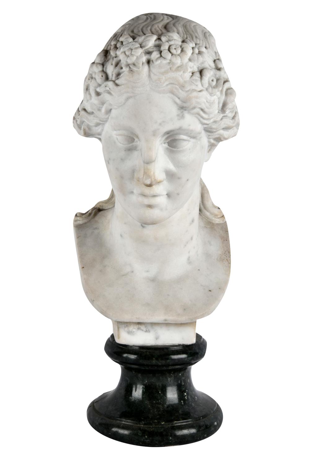 Appraisal: MARBLE BUST OF A WOMANunsigned mounted to a pedestal Condition