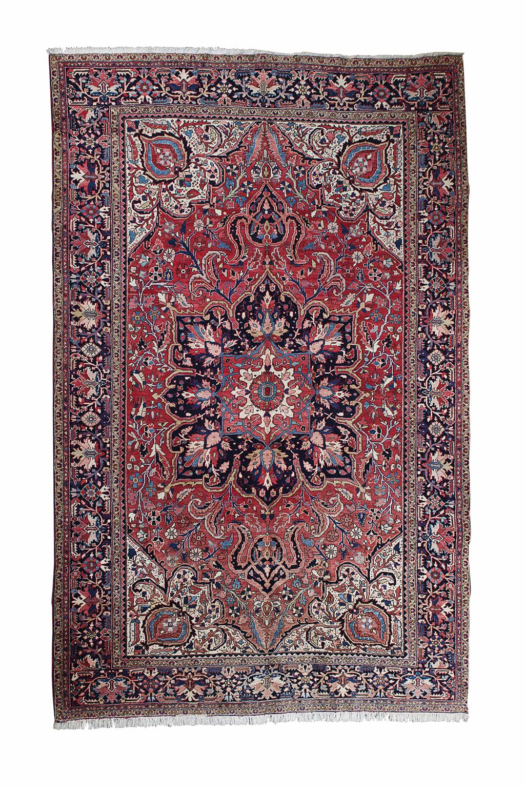 Appraisal: HERIZ CARPET NORTHWEST PERSIA LATE TH CENTURY the red field