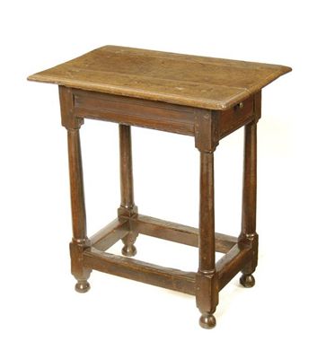 Appraisal: An early th century oak side table the moulded edge