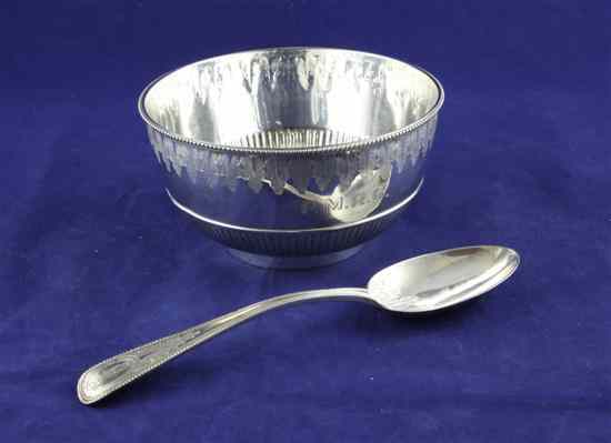 Appraisal: A Victorian demi fluted silver christening bowl and matching spoon