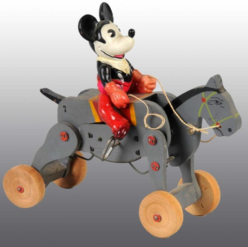 Appraisal: Celluloid Walt Disney Mickey Mouse Cowboy Toy Description Japanese Pre-war