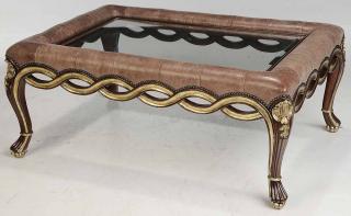 Appraisal: Leather and Glass Cocktail Table wood carved and gold accent