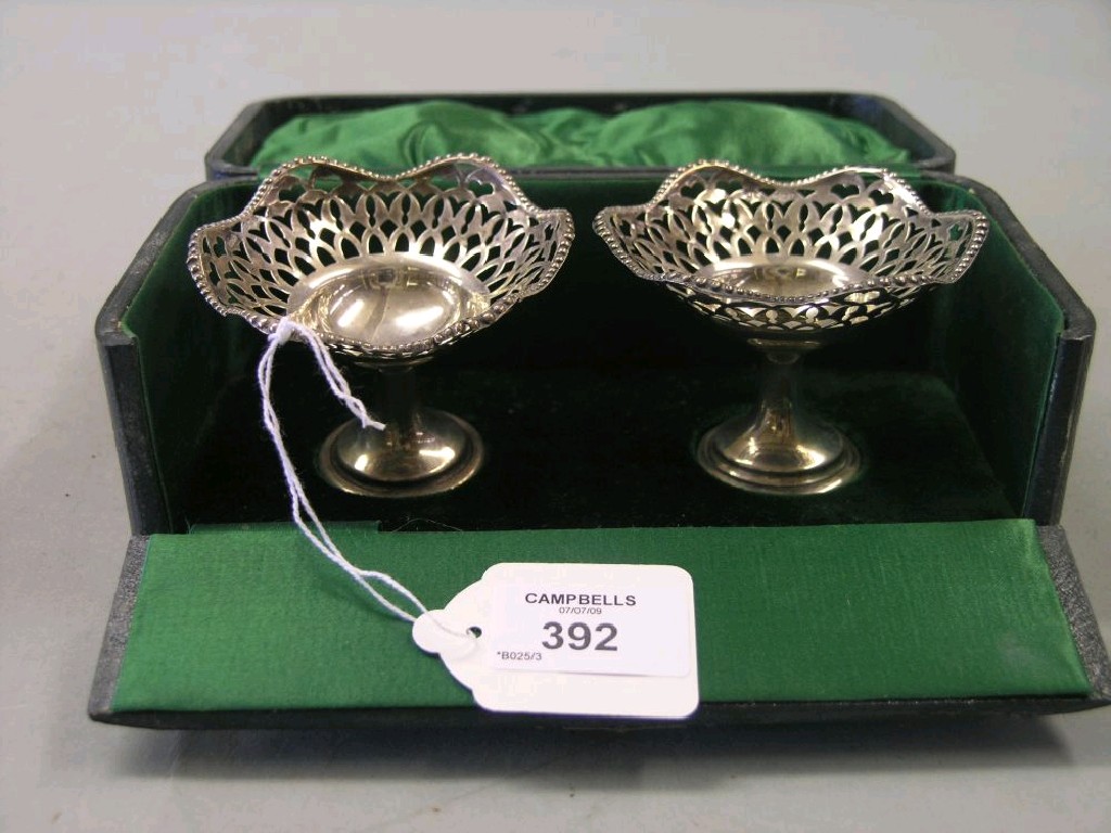 Appraisal: A pair of pierced silver pedestal dishes Birmingham in high