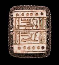 Appraisal: Egyptian Tablet Brooch Egyptian tablet featuring various heiroglyphs is set