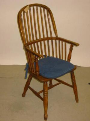 Appraisal: AN ASH WINDSOR ARM CHAIR of high double hoop stick