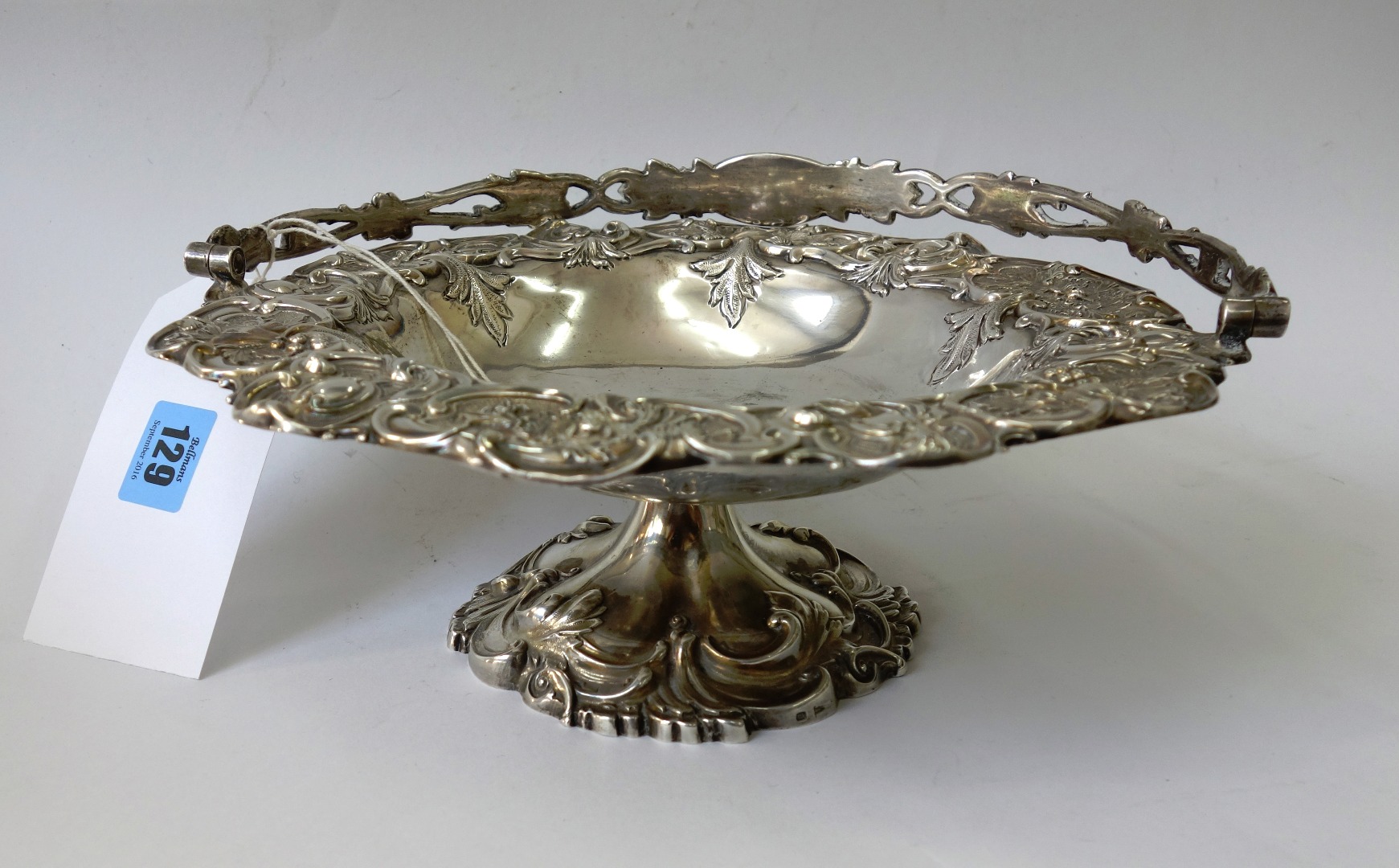 Appraisal: A late Victorian silver cake basket Walker Hall Sheffield in